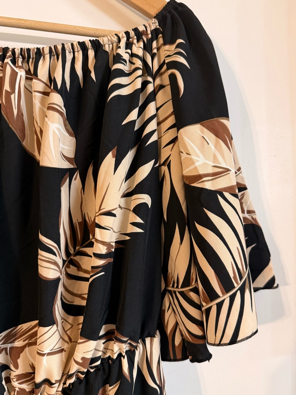 Lizzie’s Boutique Off-Shoulder Black and Beige Tropical Print Romper - Picture 12 of 13